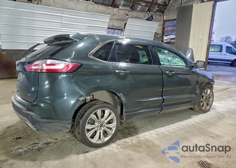2022 Ford Edge Titanium z USA, uszkodzony, nr VIN 2FMPK4K96NBA07127